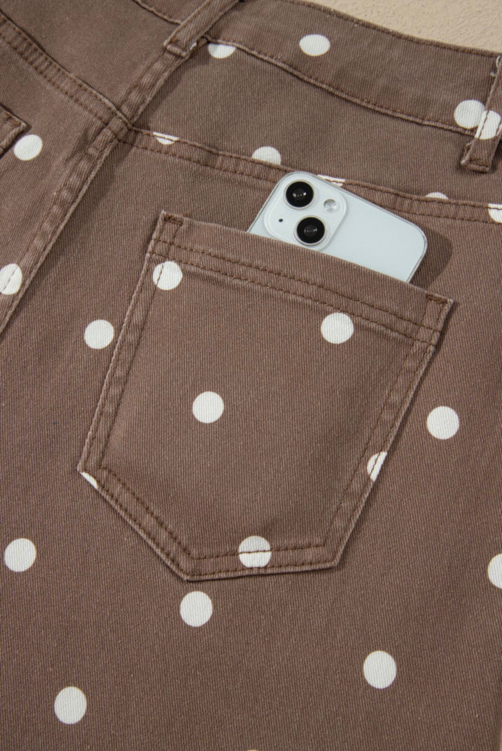 Cocoa brown polka dot barrel jean back pocket detail