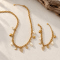 Étoile charm necklace and bracelet set in gold tone