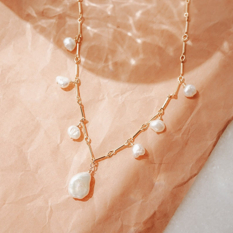 Margaux freshwater pearl necklace on blush background